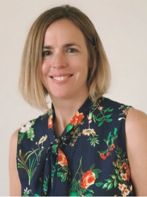 Jenny James, woman with shoulder length blonde hair, light complexion, and a floral shirt